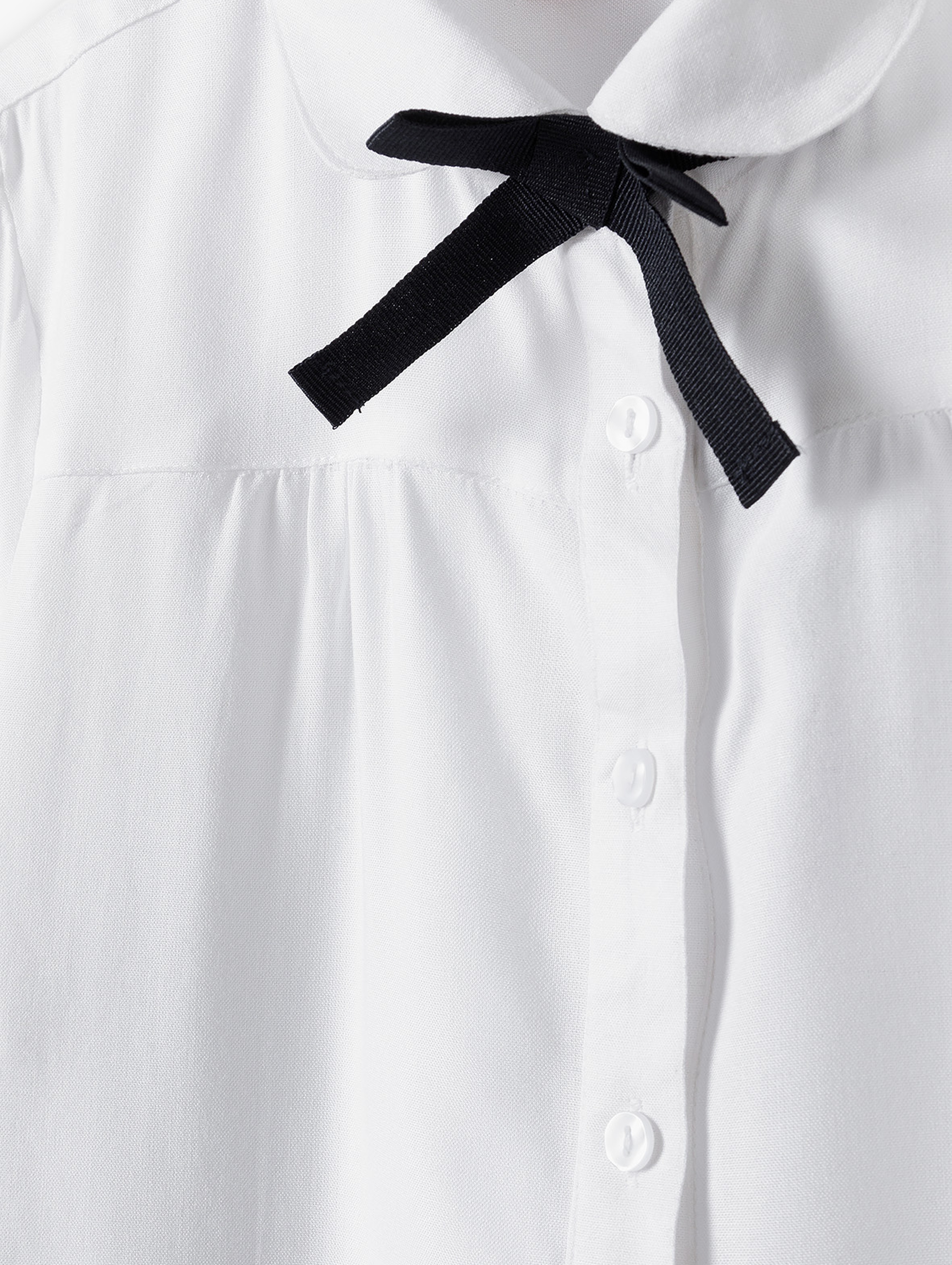 Elegancka biała koszula dla dziewczynki z kołnierzykiem