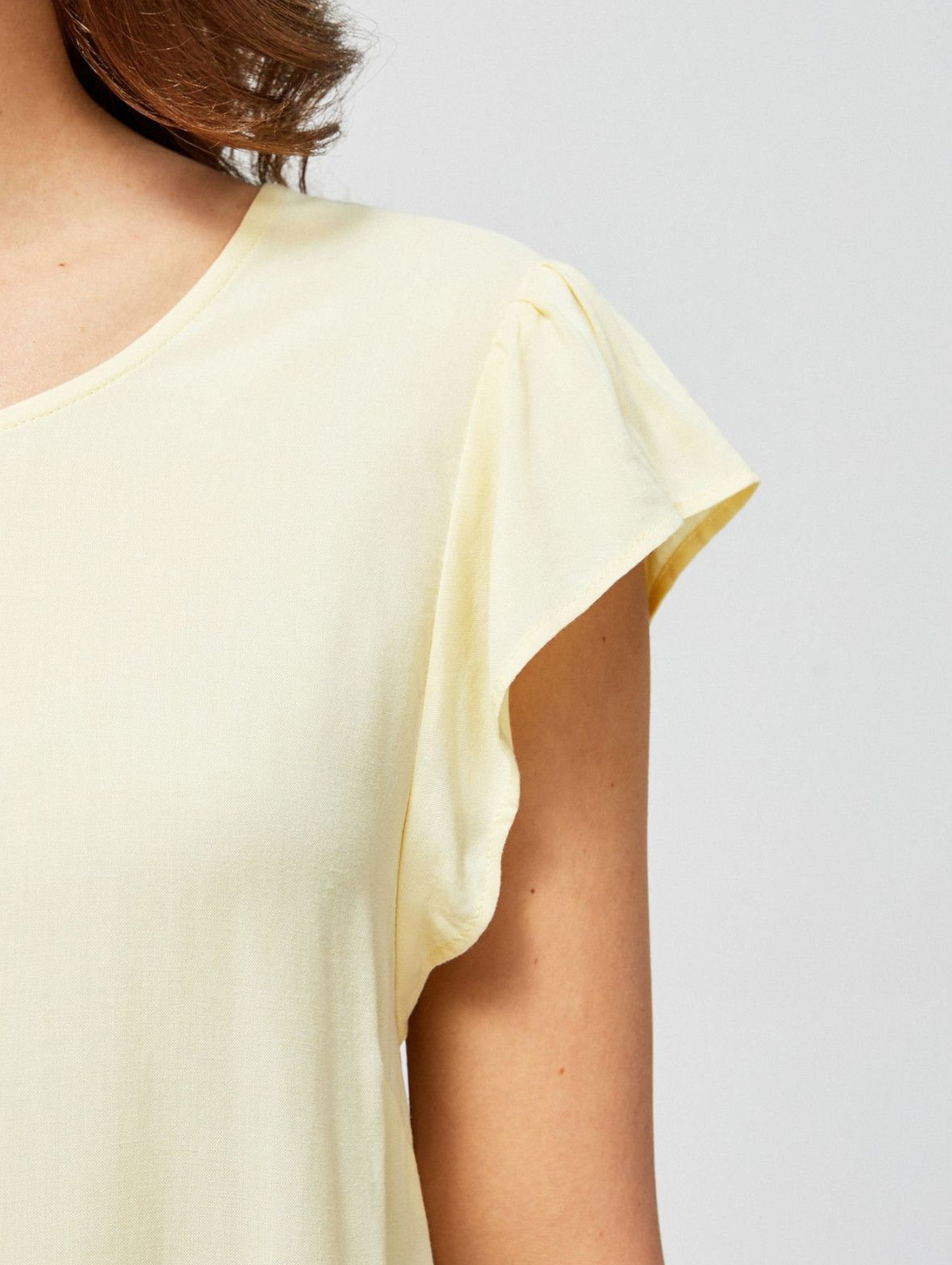 Bluzka damska koszulowa z ozdobnym wiązaniem żółta