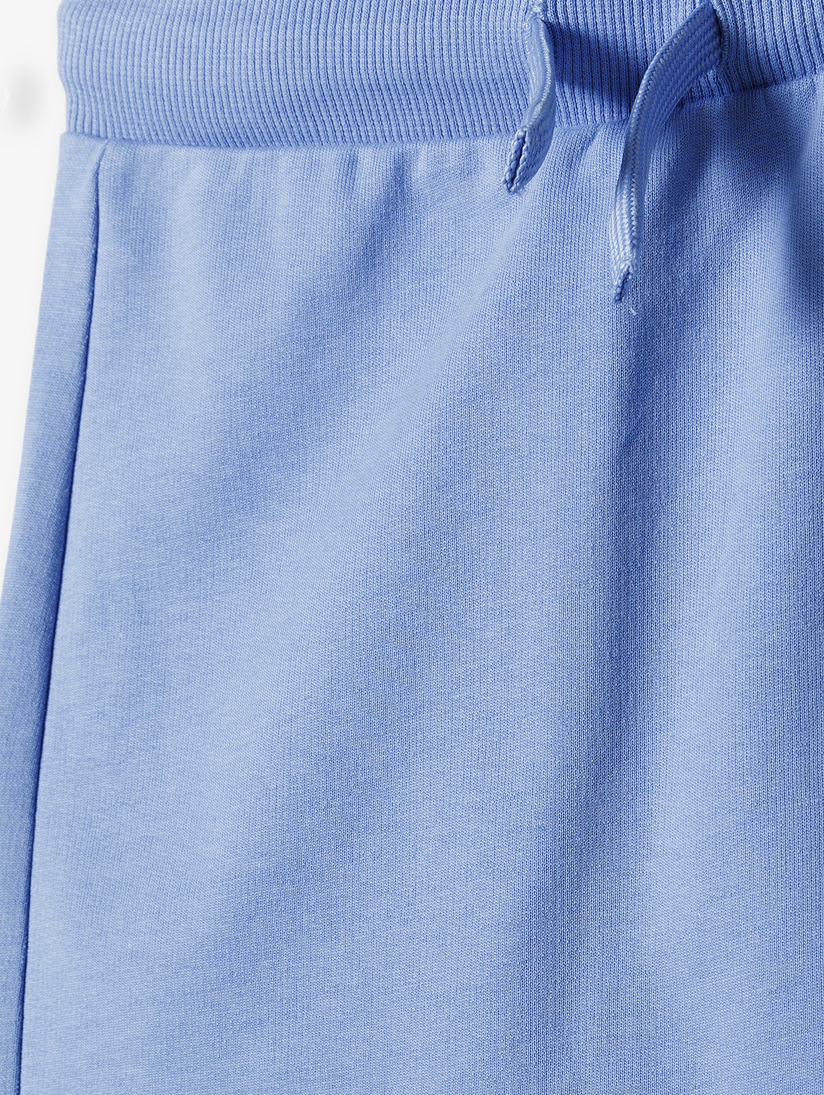 Niebieskie spodnie dresowe z łatkami - 5.10.15.