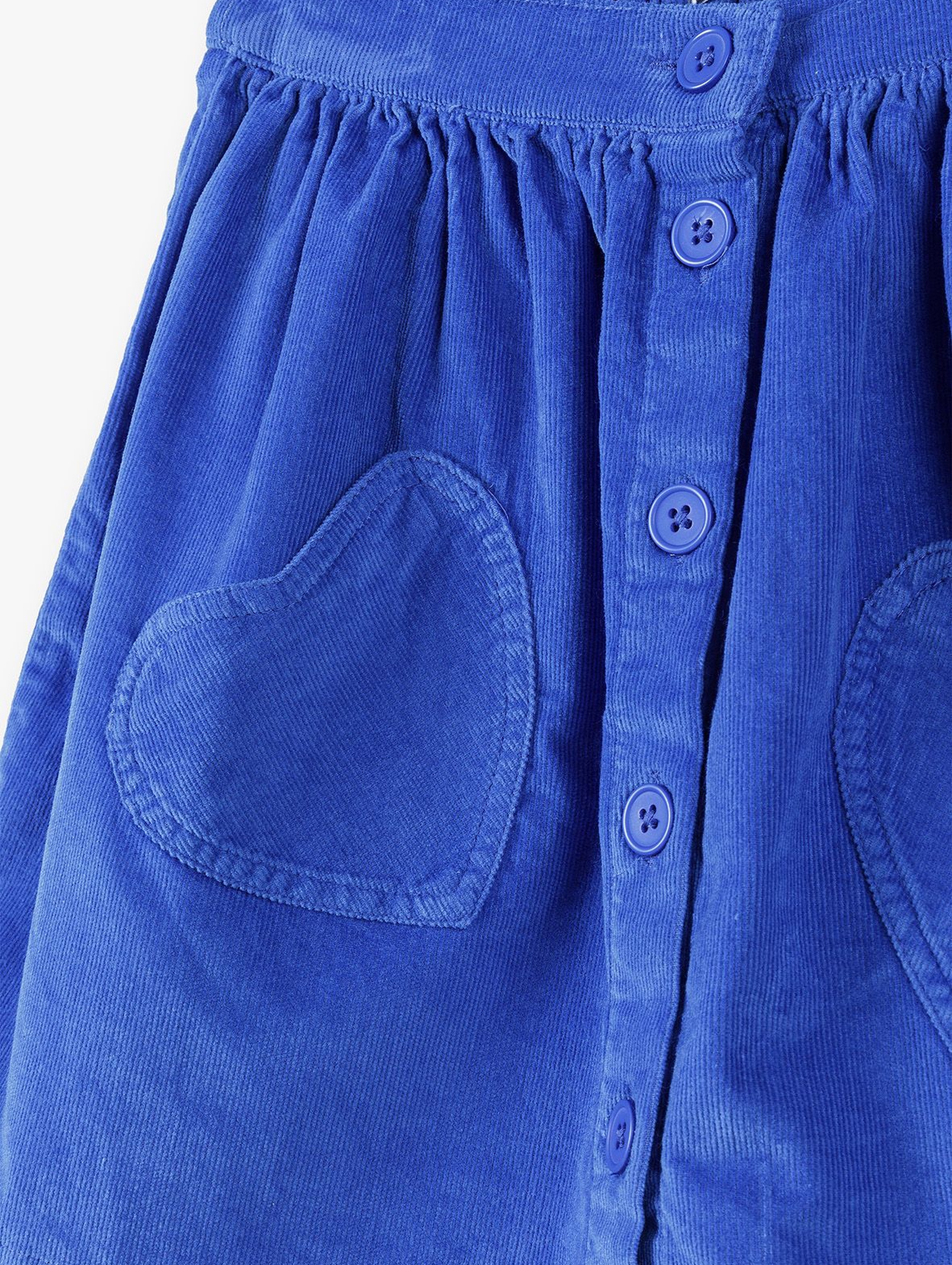 Niebieska spódniczka z miękkiego sztruksu z dwoma kiszeniami