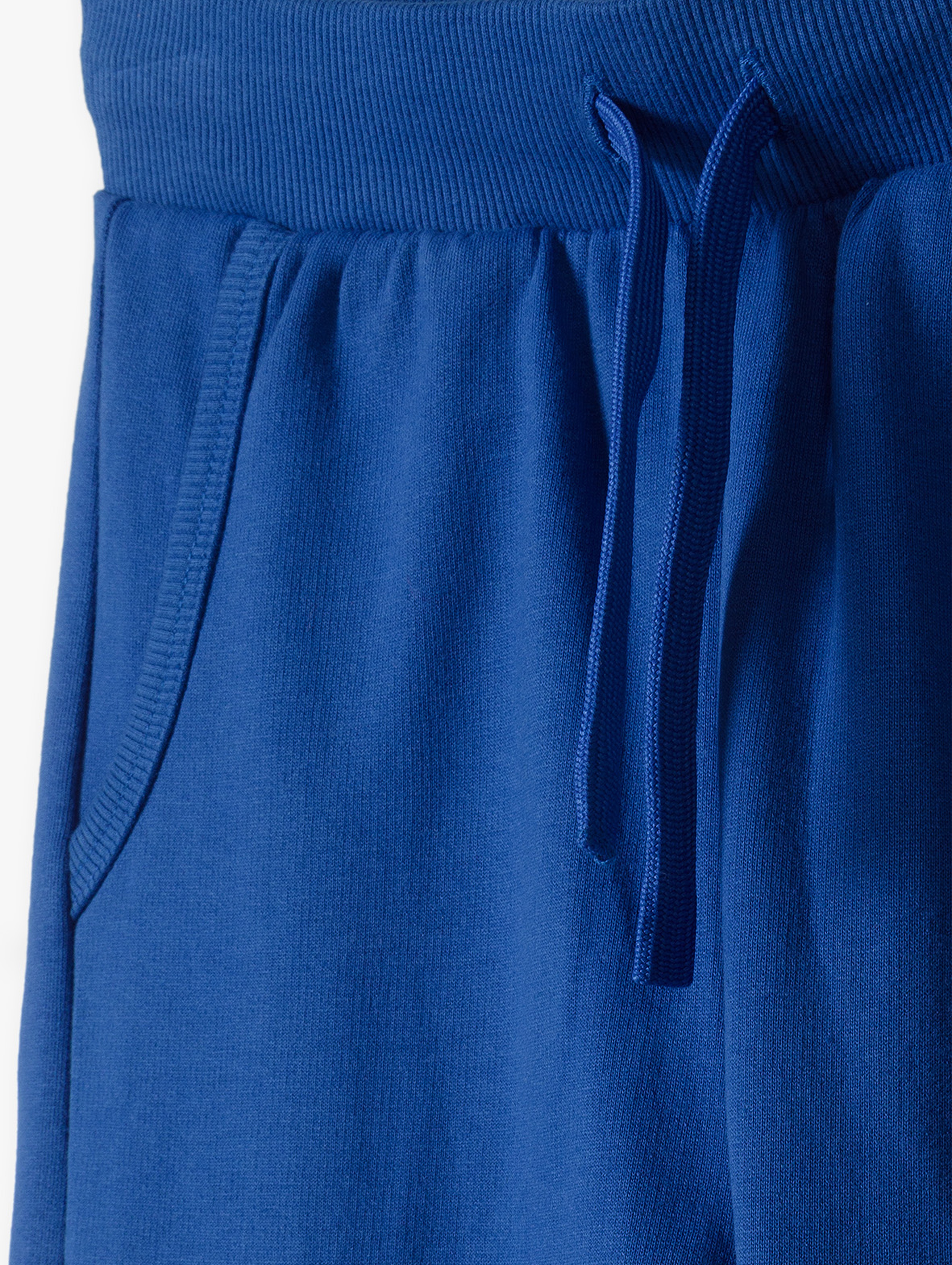 Spodnie dresowe dla chłopca - niebieskie - slim - Lincoln&Sharks