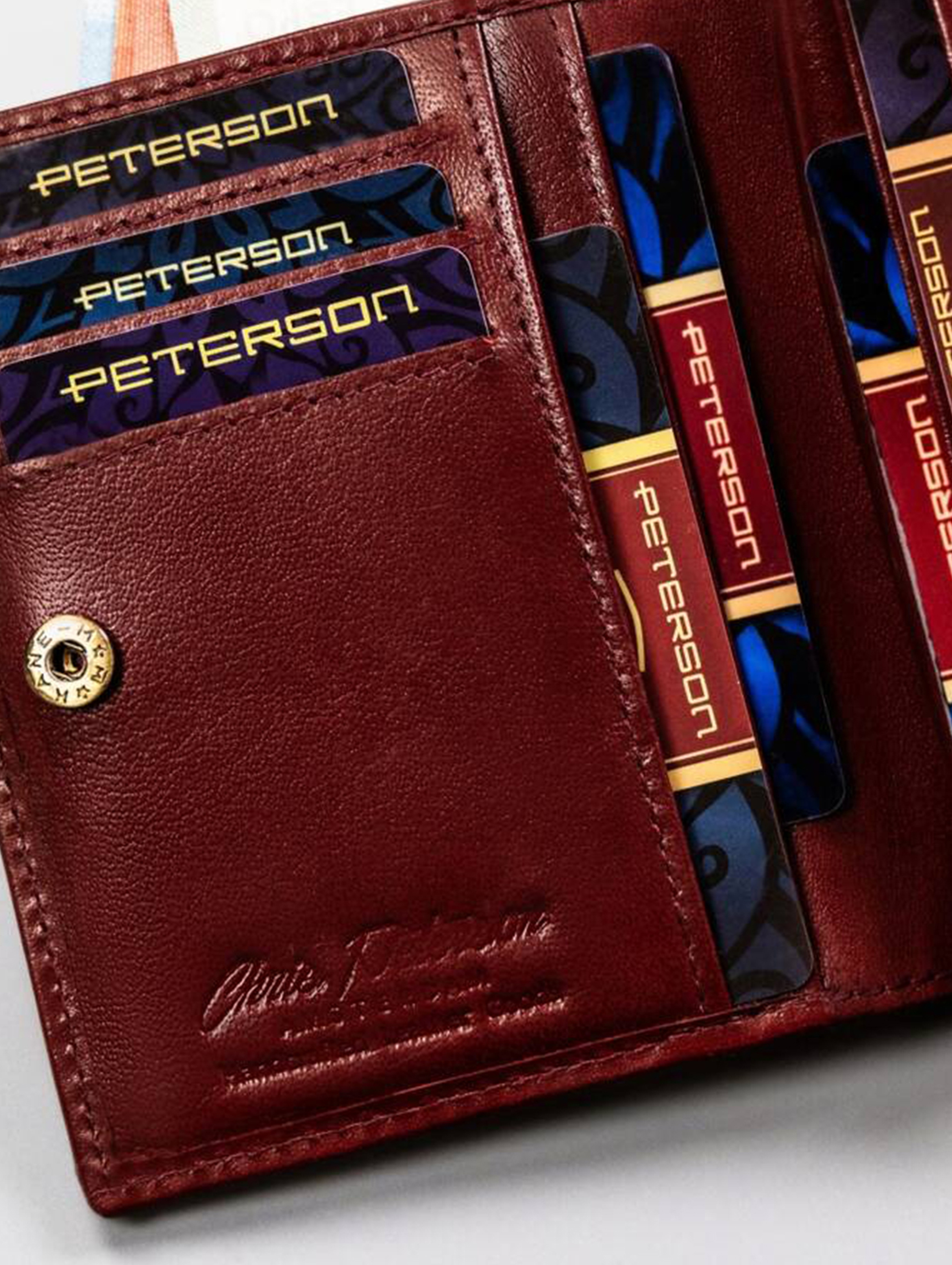 Peterson Skórzany portfel damski średnich rozmiarów bordowy