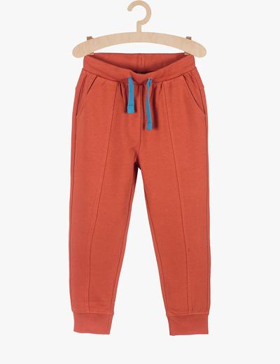 Spodnie dresowe dla chłopca - pomarańczowe