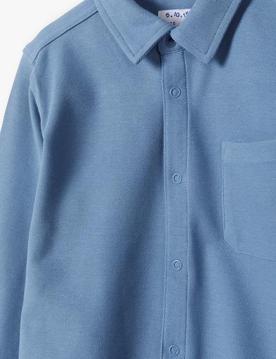 Bawełniana koszula chłopięca pique z długim rękawem i kieszonką- niebieska