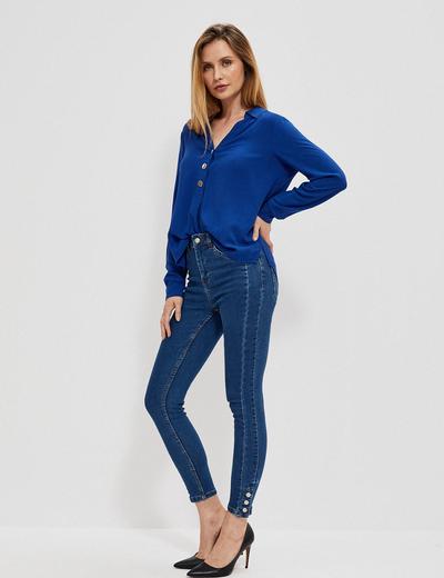 Niebieskie spodnie damskie jeansowe rurki z ozdobnymi guzikami