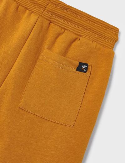 Pomarańczowe spodnie dresowe chłopięce