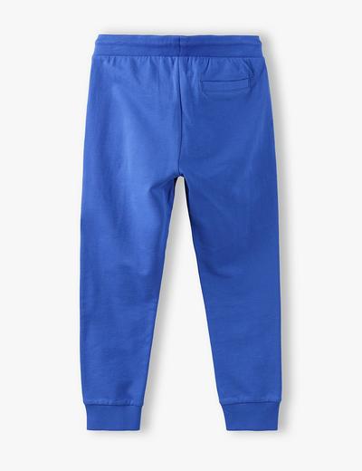Spodnie dresowe chłopięce w kolorze niebieskim