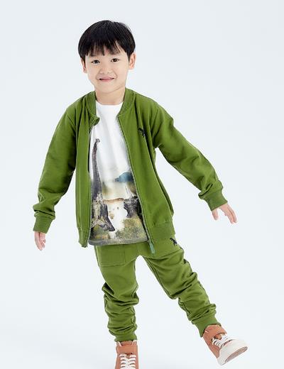 Zielone dresowe spodnie slim dla chłopca z dinozaurem