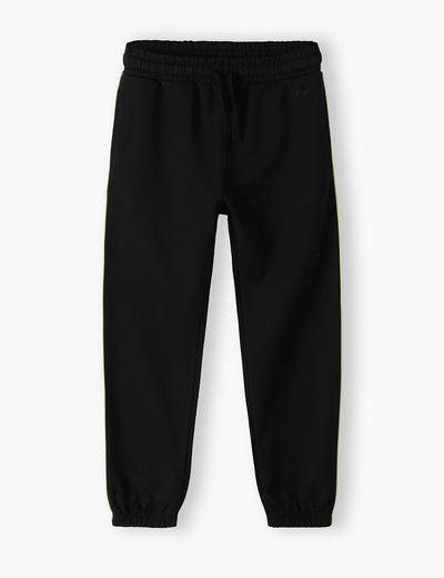 Czarne spodnie dresowe typu joggersy z lampasami - Lincoln&Sharks