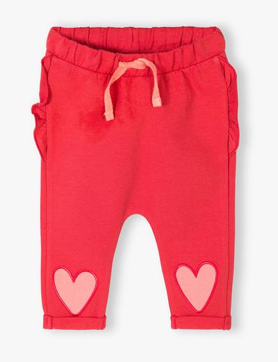 Spodnie niemowlęce dla dziewczynki z falbankami - czerwone