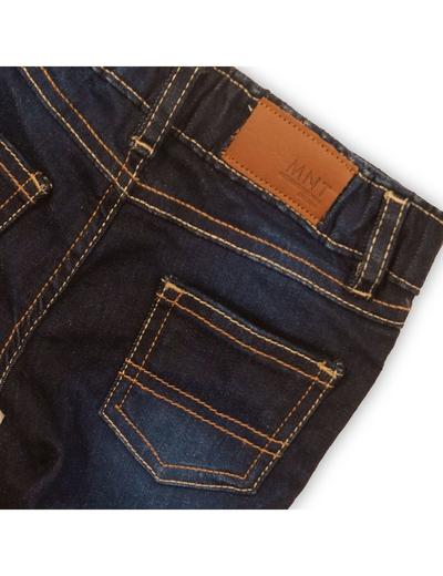 Granatowe jeansowe spodnie niemowlęce z kieszeniami