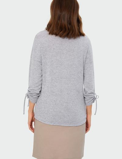 Sweter o luźnym kroju ściągacz na rękawie z troczkiem- ubrania dla kobiet