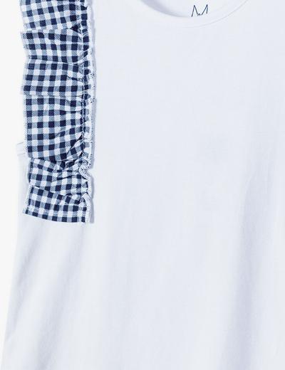 Biała bluzka dziewczęca z ozdobną falbanką