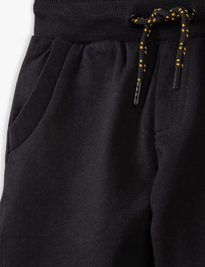 Bawełniane spodnie dresowe chłopięce w kolorze czarnym