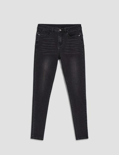Czarne spodnie damskie jeansowe skinny z przetarciami