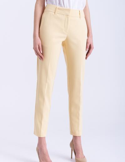 Eleganckie spodnie damskie z kantką żółte