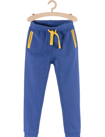 Spodnie dresowe dla chłopca niebieskie z żółtymi wstawkami