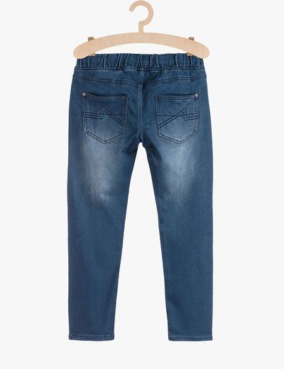 Jeansowe spodnie dla chłopca- niebieskie z przetarciami
