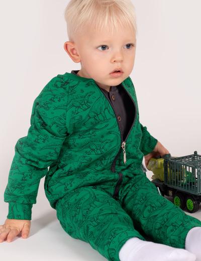 Zielone spodnie dresowe niemowlęce w dinozaury z dzianiny