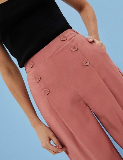 Szerokie spodnie damskie z dodatkiem wiskozy różowe