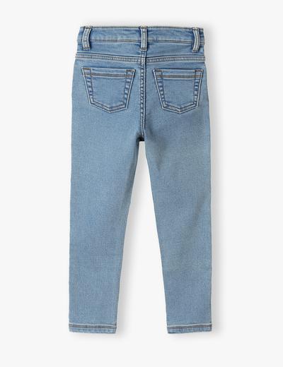 Niebieskie jeansowe spodnie dla dziewczynki 5.10.15.