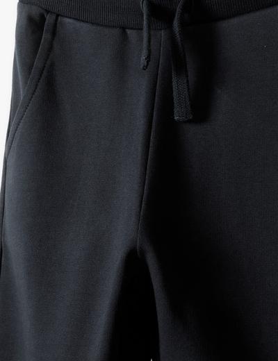 Czarne dzianinowe spodnie dresowe dla chłopca- New generation