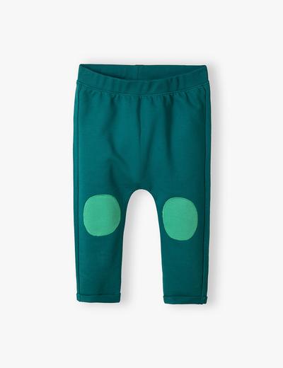 Zielone bawełniane spodnie niemowlęce z naszywkami na kolanach