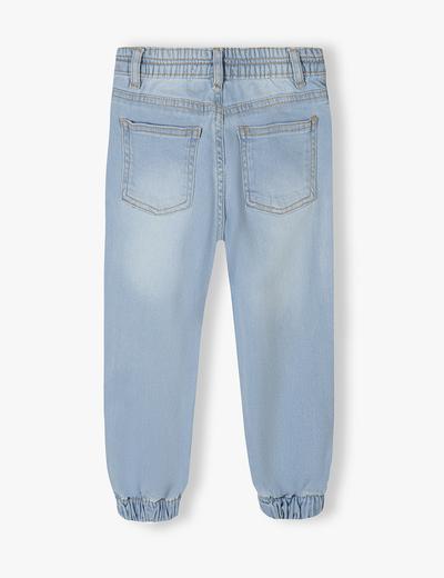 Jasne spodnie jeansowe typu joggery niemowlęce