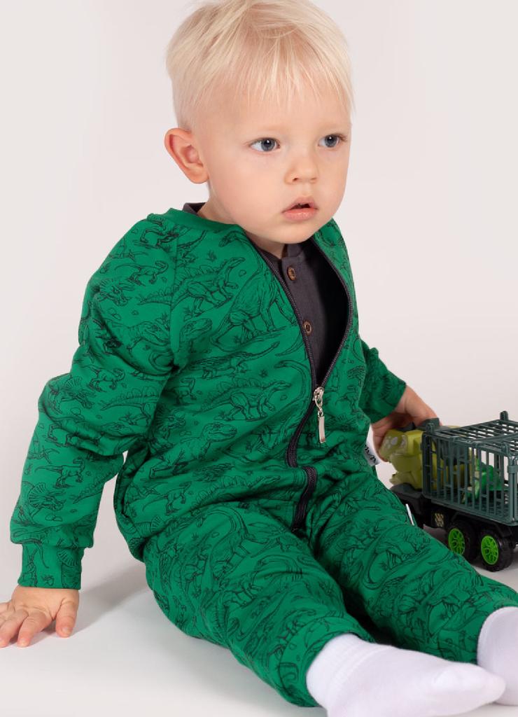 Zielone spodnie dresowe niemowlęce w dinozaury z dzianiny