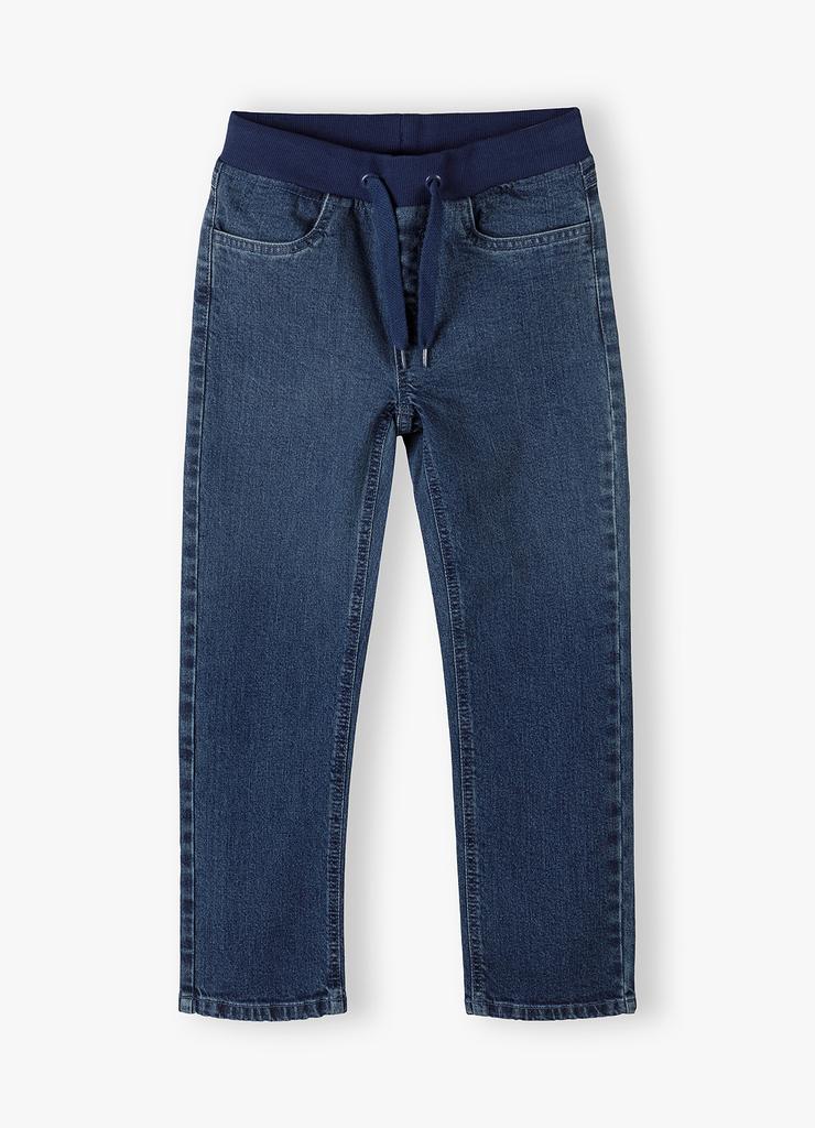 Spodnie jeansowe dla chłopca fason straight leg - niebieskie