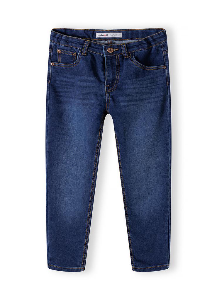 Ciemnoniebieskie klasyczne jeansy dopasowane chłopięce